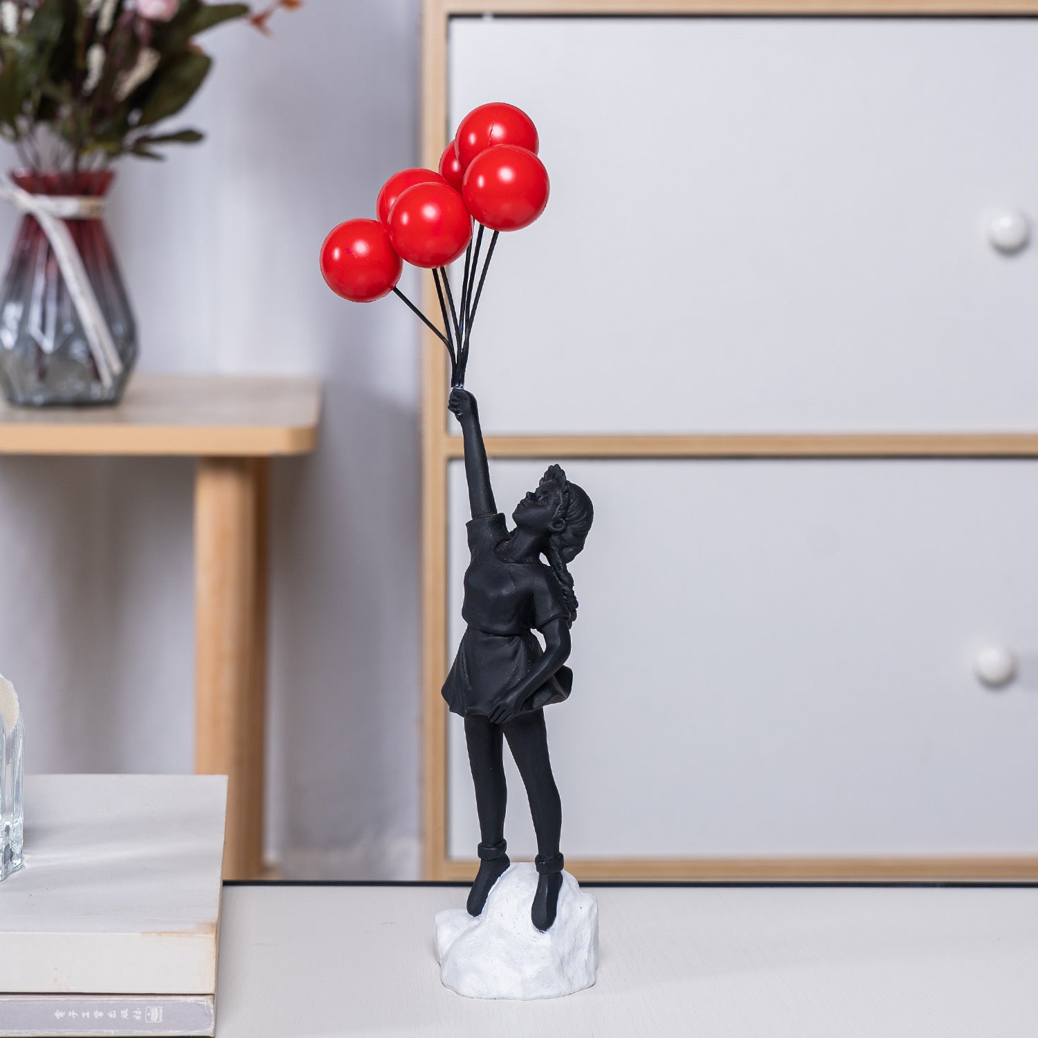 Girl Holding Flying Balloons Sculpture