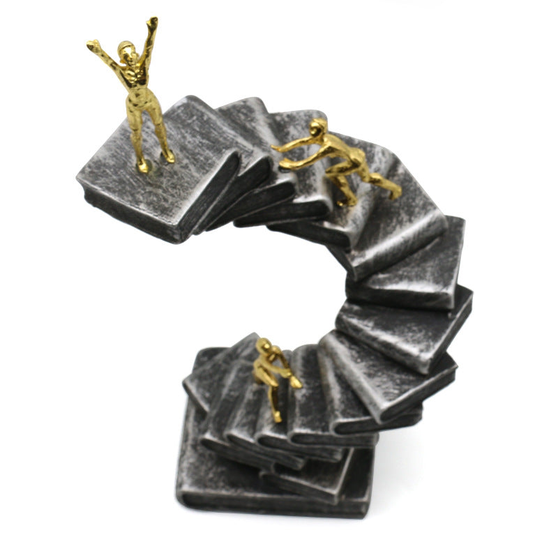 Reaching Summits Through Education Sculpture
