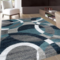 Nordic Orbit Area Rug in Teal